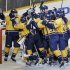 The Nashville Predators celebrate after defeating the Detroit Red Wings 2-1 in Game 5 of a first-round NHL hockey playoff series on Friday, April 20, 2012, in Nashville, Tenn. The Predators won the series 4-1. (AP Photo/Mark Humphrey)