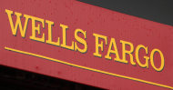 <p>               This Jan. 12, 2012 photo shows the logo at a Wells Fargo Home Mortgage center in Pittsburgh. Wells Fargo & Co. said Tuesday, Jan. 17, 2012, its fourth-quarter profit rose 20 percent, helped by better performance of its loans, growth in deposits and a steadying mortgage business. (AP Photo/Gene J. Puskar)