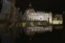 Saint Peter's Basilica is seen reflected during the conclave at the Vatican