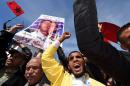 Moroccan protesters hold signs and shout slogans in the capital Rabat, on March 13, 2016, during a demonstration against statements made by the UN chief earlier in the week regarding the Western Sahara