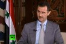 In this image made from video, Syrian President Bashar Assad speaks with English-language television channel Russia Today recorded at an unknown date in Damascus, Syria. Assad vowed to "to live in Syria and die in Syria", declaring in an interview broadcast Thursday, Nov. 8, 2012 that he will never flee his country despite the bloody, 19-month-old uprising against him. (AP Photo) RUSSIA OUT TV OUT