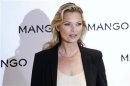 British model Kate Moss poses during the launch of the new Mango 2012 collection in London