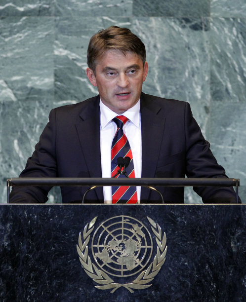 RETRANSMISSION TO CORRECT YEAR - Zeljko Komsic, President of Bosnia and Herzegovina, addresses the 66th session of the United Nations General Assembly at U.N. headquarters Wednesday, Sept. 21, 2011. (AP Photo/Jason DeCrow)
