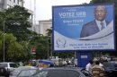 A portrait of Union of Republican Force candidate Sidya Toure on a political board in Conakry on August 31, 2013