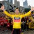 Cadel Evans, the winner of the Tour de France 2011, celebrates his achievement of becoming the first Australian to win the most prestigious event in cycling with local fans at Federation Square in Melbourne, Australia, Friday, Aug. 12, 2011. (AP Photo/Mal Fairclough, Pool)