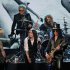 Guns N' Roses' Duff McKagan, left, Matt Sorum, top left, Steven Adler, top right, and Slash, right, perform with guest vocalist Myles Kennedy after induction onto the Rock and Roll Hall of Fame Sunday, April 15, 2012, in Cleveland. (AP Photo/Tony Dejak)