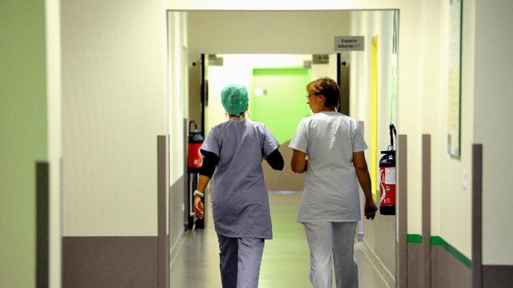 Nurses walk in a corridor on September 20, 2013 in a hospital in France
