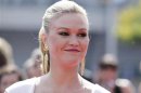 Actress Julia Stiles arrives at the 2011 Primetime Creative Arts Emmy Awards in Los Angeles