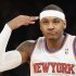 New York Knicks forward Carmelo Anthony gestures after hitting a three-pointer against the Los Angeles Lakers in the first quarter of their NBA basketball game in New York