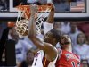 Miami Heat's Chris Bosh slam dunks over Chicago Bulls' Joakim Noah during Game 2 of their NBA Eastern Conference semi-final basketball playoff in Miami