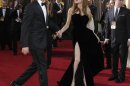 Actress Angelina Jolie, right, and actor Brad Pitt arrive before the 84th Academy Awards on Sunday, Feb. 26, 2012, in the Hollywood section of Los Angeles. (AP Photo/Amy Sancetta)