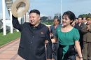 North Korea's First Lady Was Cheerleader, Ditches Drab Outfits