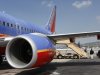 This March 13, 2010 photo, shows a Southwest Airlines plane in Burbank, Calif. Southwest Airlines Co. reports quarterly financial results before the market open on Thursday, April 25, 2013. (AP Photo/Paul Sakuma)