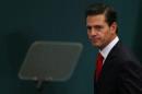 Mexico's President Enrique Pena Nieto takes part during the deliver of a message about foreign affairs at Los Pinos presidential residence in Mexico City
