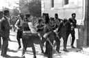 FILE - Bosnian Serb nationalist Gavrilo Princip, right, is captured by police and taken to the police station in Sarajevo, Yugoslavia, June 28, 1914, after he assassinated the Archduke Franz Ferdinand, heir to the Austrian-Hungarina throne, and his wife, triggering the clash of alliances that became World War I. The past month exposes the limits of leaders who try to shape the world _ and how unexpected actions by individuals like Princip can influence the course of history. And in the information age, there is more space for individuals who are not in positions of power to make a footprint in history, by design or by accident. (AP Photo, Files)