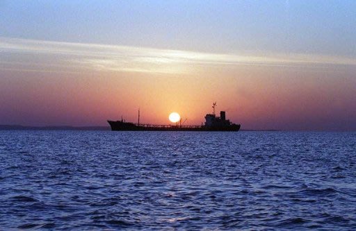 An Iranian water storage tanker sails off the coast of Qeshm Island in the Strait of Hormuz