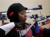 Qatar's Bahya Mansour Al Hamad prepares before the women's 10m air rifle qualification competition at the London 2012 Olympic Games in the Royal Artillery Barracks at Woolwich in southeast London