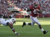 Alabama running back Eddie Lacy (42) scores a touchdown as Auburn defensive end Dee Ford (95) pursues during the first half of a NCAA college football game at Bryant-Denny Stadium in Tuscaloosa, Ala., Saturday, Nov. 24, 2012. (AP Photo/Dave Martin)