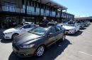 A fleet of Uber's Ford Fusion self driving cars are shown during a demonstration of self-driving automotive technology in Pittsburgh