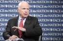 Senator John McCain speaks on CBS' "Face the Nation" in this handout photo
