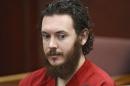 FILE - This June 4, 2013 file photo shows Aurora theater shooting suspect James Holmes in court in Centennial, Colo. Prosecutors in the Colorado theater shooting case are hinting they might want to search for additional evidence or look for more documents, although they aren't publicly saying why. In a motion filed Friday and released Monday, April 28, 2014, prosecutors asked the judge to keep secret any future requests they might make for search warrants or for court orders to produce records. Holmes pleaded not guilty by reason of insanity to multiple counts of murder and attempted murder in the 2012 attack on a suburban Denver movie theater, which killed 12 people and injured 70. Prosecutors are seeking the death penalty. His trial is scheduled to start in October. (AP Photo/The Denver Post, Andy Cross, Pool, File)
