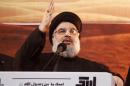 Lebanon's Hezbollah leader Sayyed Hassan Nasrallah addresses supporters at an Ashoura ceremony in Beirut