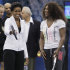 First lady Michelle Obama, left, and Serena Williams talk during a U.S. Open tennis clinic highlighting the importance of physical activity for kids at Billie Jean King National Tennis Center in New York, Friday, Sept. 9, 2011. (AP Photo/Mike Groll)
