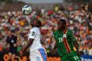 Democratic Republic of the Congo's Firmin Ndombe Mubele (L) vies with Zambia's Emmanuel Mbola (R) during the 2015 African Cup of Nations group B football match in Ebebiyin on January 18, 2015