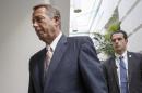 Speaker of the House John Boehner, R-Ohio, arrives for a meeting of the Republican Conference on Capitol Hill in Washington, Tuesday, July 29, 2014. (AP Photo/J. Scott Applewhite)