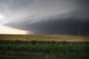 A large storm cell, which reportedly produced a multiple vortex tornado, passes south of El Reno, Oklahoma
