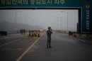 A South Korean soldier stands at a military checkpoint leading to Kaesong joint industrial complex on July 10, 2013