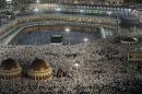 Muslim pilgrims perform their evening prayers, in Grand Mosque in the holy city of Mecca, on October 22, 2012