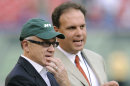 FILE - In this Sept. 3, 2009 file photo, New York Jets Chairman and CEO Woody Johnson, left, and General Manager Mike Tannenbaum talk prior to an NFL preseason football game against the Philadelphia Eagles at Giants Stadium in East Rutherford, N.J. The New York Jets have fired Tannenbaum and say coach Rex Ryan will be back next season. Johnson said in a statement Monday, Dec. 31, 2012, that "like all Jets fans, I am disappointed with this year's results." (AP Photo/Bill Kostroun, File)