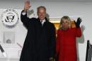 U.S. Vice President Joe Biden and his wife Jill wave upon their arrival at Boryspil International airport outside Kiev