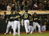 Athletics' Moss celebrates after home run against New York Yankees in Oakland