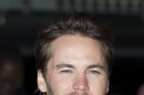 In this Thursday, March 1, 2012 file photo, Taylor Kitsch arrives for the UK premiere of John Carter at a central London venue. A Philippine official said Kitsch was not hassled at Manila's airport recently, as the Canadian actor indicated this week. (AP Photo/Jonathan Short, File)