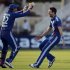 England's Anderson celebrates with teammate Kieswetter after dismissing South Africa's Elgar during the fifth one-day international cricket match at Trent Bridge cricket ground in Nottingham