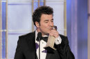 In this image released by NBC, composer Ludovic Bource accepts the award for Best Original Score for a Motion Picture for 