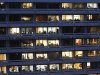 Employees are seen working in their offices in the building housing Greece's finance and development ministries in Athens