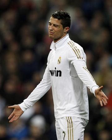 Real Madrid's Cristiano Ronaldo reacts during their Spanish King's Cup soccer match against Malaga in Madrid