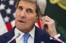 U.S. Secretary of State John Kerry puts in an ear piece for translation during a news conference with Saudi Foreign Minister Saud bin Faisal bin Abdulaziz Al Saud on Thursday, March 5, 2015, in Riyadh, Saudi Arabia. Kerry sought Thursday to ease Gulf Arab concerns about an emerging nuclear deal with Iran and explore ways to calm instability in Yemen and other troubled nations in the Middle East. (AP Photo/Evan Vucci, Pool)