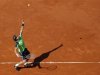 Ferrer of Spain serves to compatriot Robredo during their men's singles quarter-final match at the French Open tennis tournament in Paris