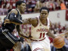 Indiana guard Yogi Ferrell, right, drives on Purdue guard Ronnie Johnson in the second half of a NCAA college basketball game in Bloomington, Ind., Saturday, Feb. 16, 2013. Indiana defeated Purdue 83-55. (AP Photo/Michael Conroy)