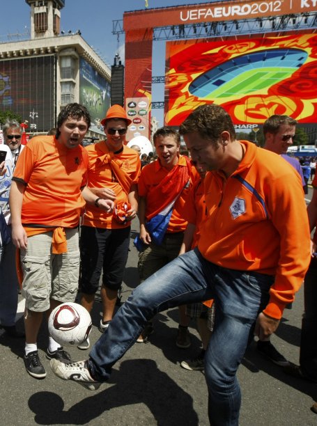 Netherlands' fans play with the ball during Kyiv Fan Zone opening ceremony