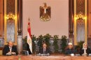 Egypt's President Mursi attends meeting with Egypt's Vice President Mekky and other politicians at presidential palace in Cairo