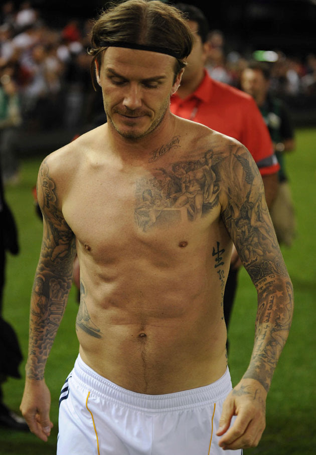previous Celebrity Tattoos David Beckham shows off his lot at the end of a