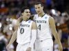 Miami's Shane Larkin (0) and Trey McKinney Jones (4) chat during a break in the second half of a third-round game of the NCAA college basketball tournament against the Illinois Sunday, March 24, 2013, in Austin, Texas. (AP Photo/David J. Phillip)