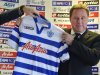 Redknapp attends a news conference as he is officially unveiled as the new manager of Queen's Park Rangers soccer club at their training ground in west London