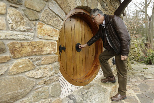 Architect Peter Archer enters the “Hobbit House” during and interview with the Associated Press Tuesday, Dec. 11, 2012, in Chester County, near Philadelphia. Archer has designed a “Hobbit House” containing a world-class collection of J.R.R. Tolkien manuscripts and memorabilia. (AP Photo/Matt Rourke)