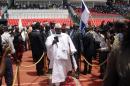 Gambian President Yahyah Jammeh arrives to attend the inauguration ceremony of the new president of Guinea-Bissau in a stadium in the capital Bissau on June 23, 2014
